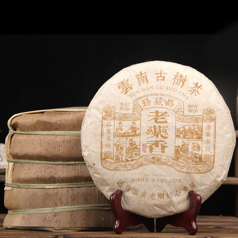Aged Yunnan white tea cake product presentation