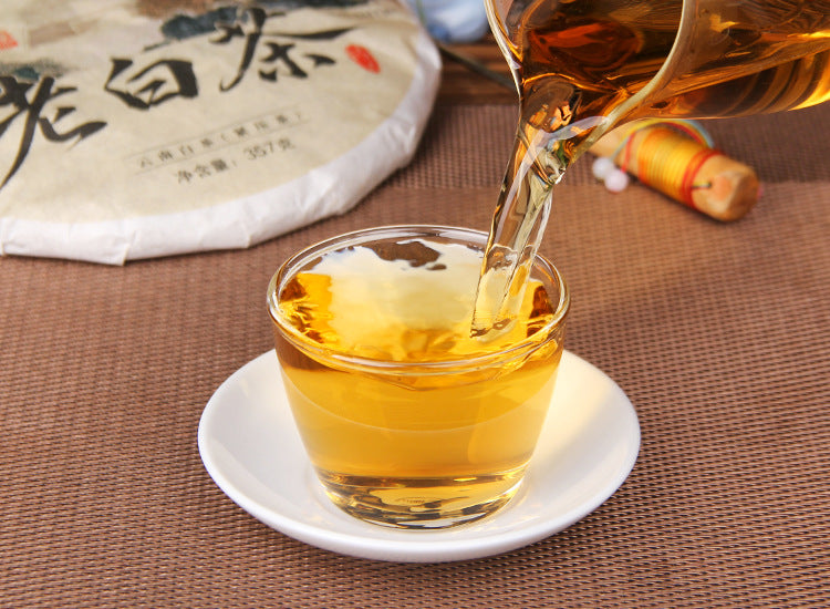 Aged Yunnan white tea 357g cake with sun-dried leaf material