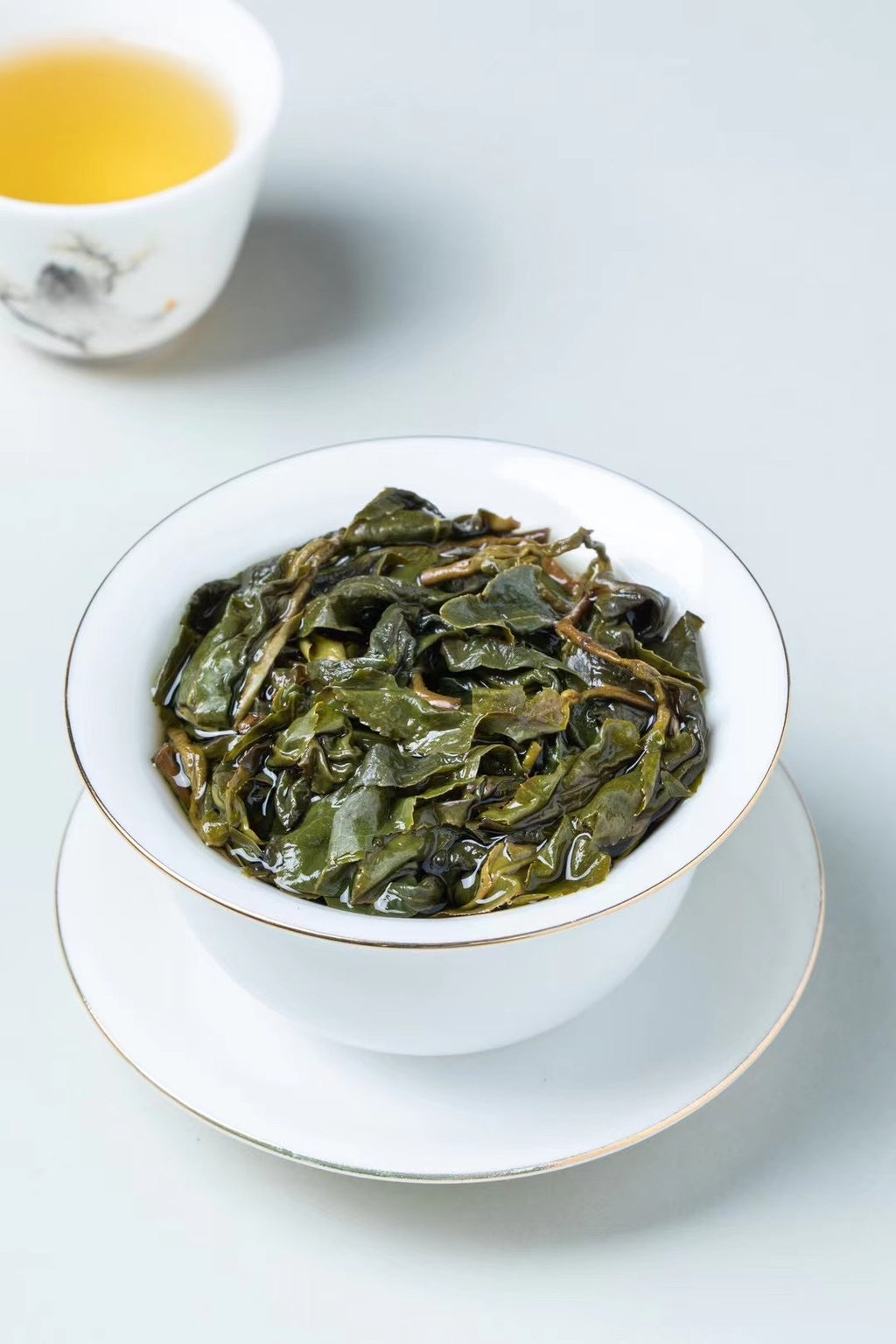 Opened Taiwan high mountain oolong leaves after brewing