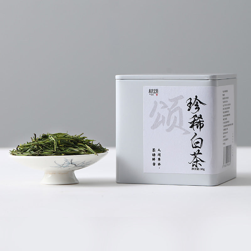 Anji Bai Cha green tea liquor and tender leaves