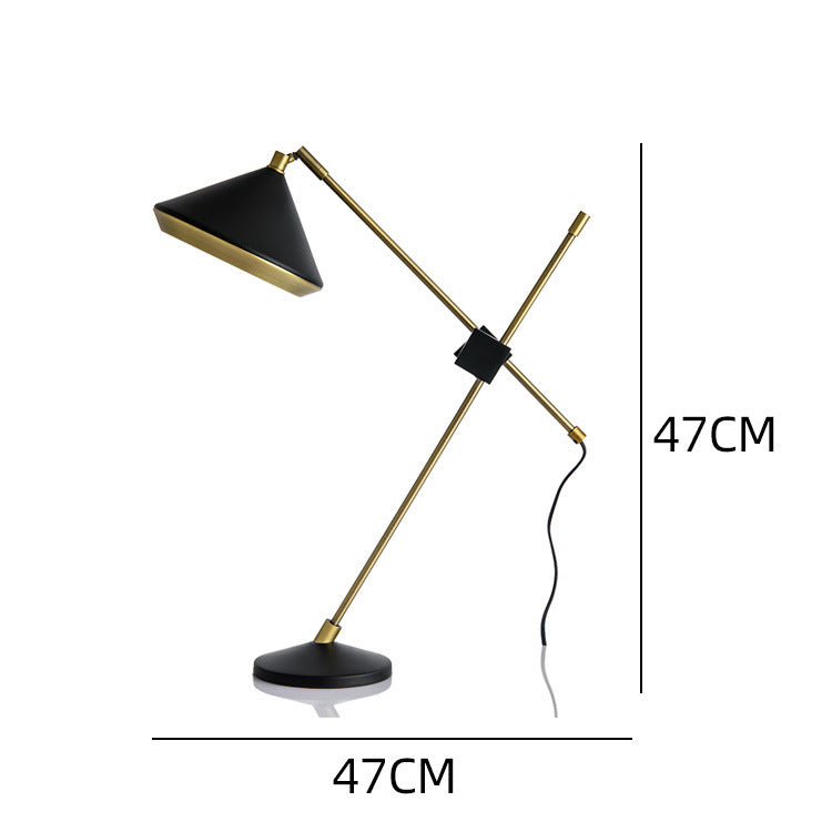 Black and brass adjustable table lamp, approximately 47 cm wide and 47 cm high
