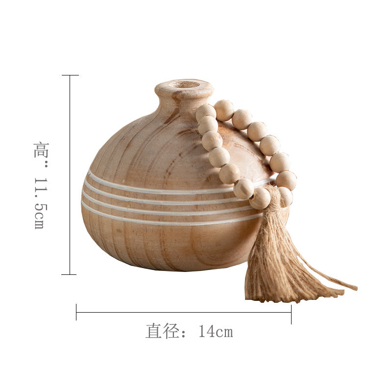 Petite round natural wood vase, 14 cm wide and 11.5 cm high