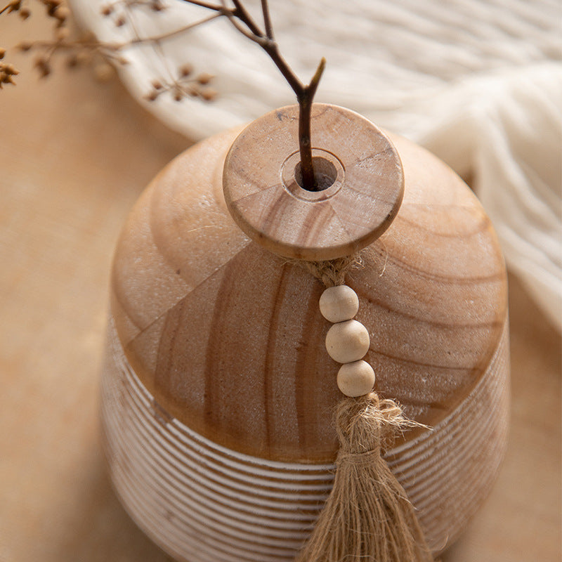 Natural wood vase top grain, bead garland and tassel detail