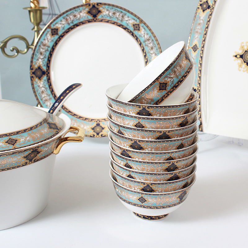 Bibo porcelain dinner plates and deep plates with turquoise navy border and gilded decorative details
