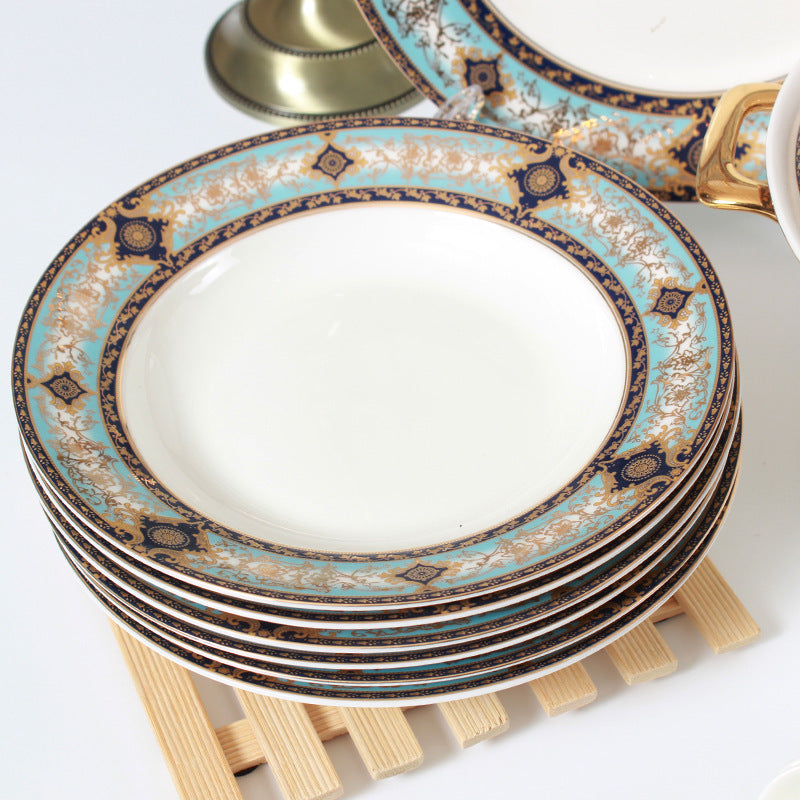 Bibo porcelain casserole and serving ware with turquoise blue ornament and gilded accents