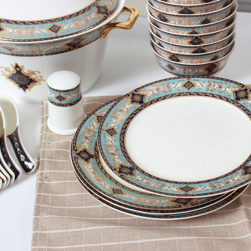 Luxury turquoise navy and gold porcelain dinnerware place setting from the Bibo 46-piece collection