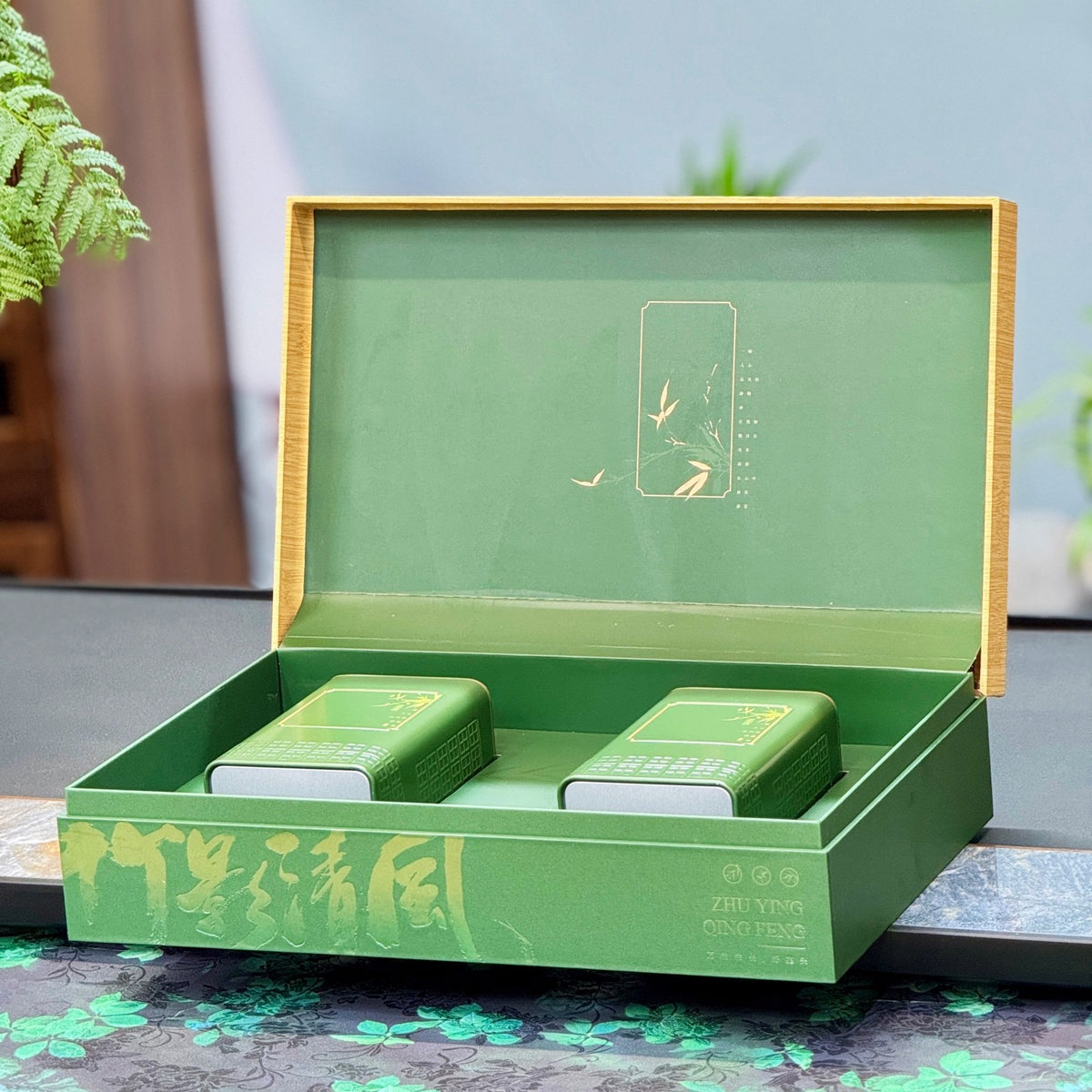 Open Bi Luo Chun green gift box showing two tea tins