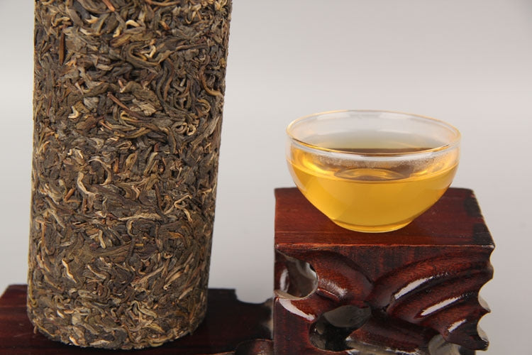 Bingdao raw Pu-erh tea column with brewed tea