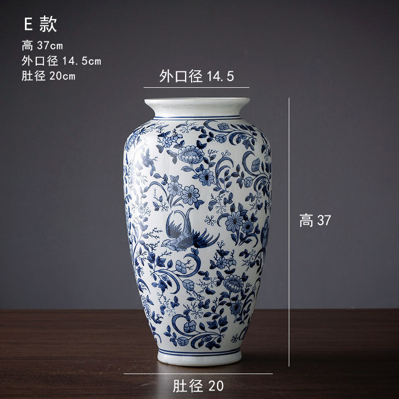 Blue and white bird and flower radish vase, 37 cm high