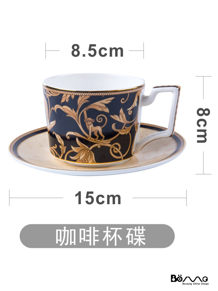 Black and gold bone china coffee cup and saucer with approximately 15 cm saucer