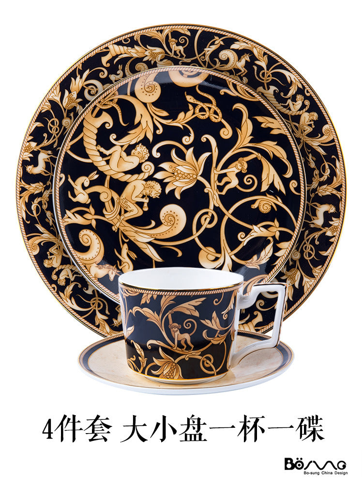 Four-piece black and gold bone china place setting with large plate, small plate, coffee cup and saucer