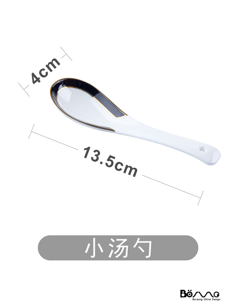 Black and gold bone china small soup spoon, approximately 13.5 cm long and 4 cm wide