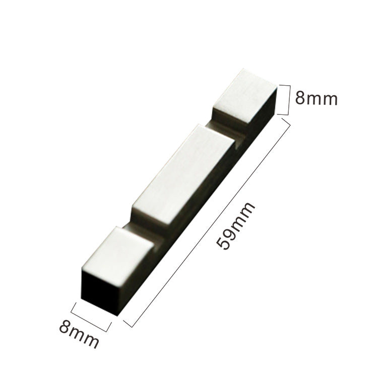 Black and gold rectangular chopstick rest, approximately 59 mm long
