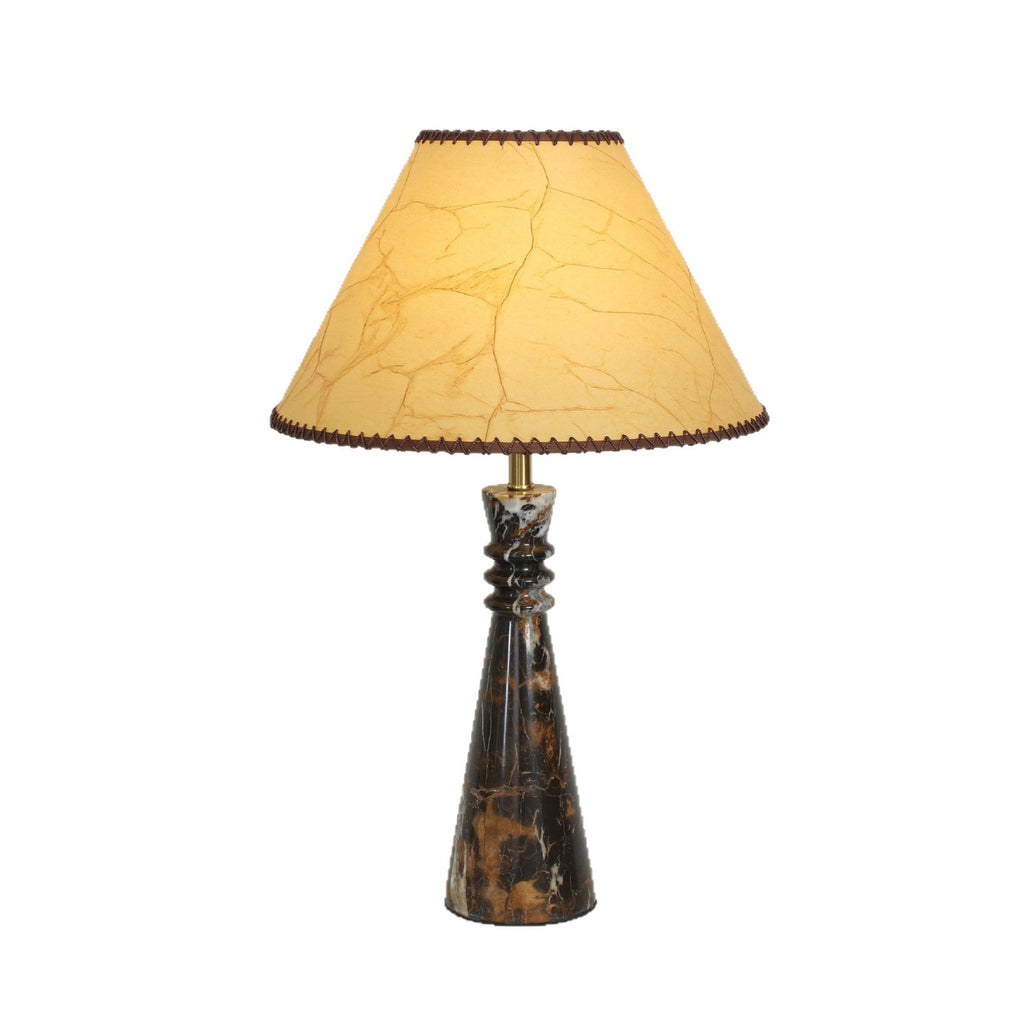 Black and gold veined marble table lamp with tapered parchment shade, product view