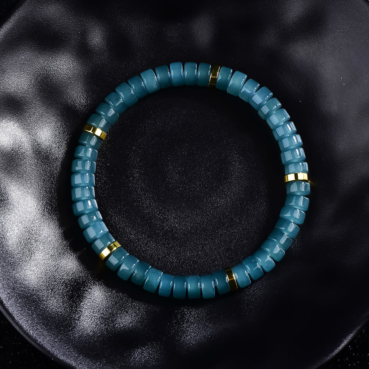 Icy blue jadeite barrel bead bracelet polished cylindrical beads