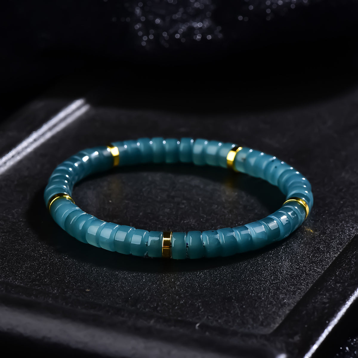 Certified jadeite barrel bead bracelet deep blue-green tone