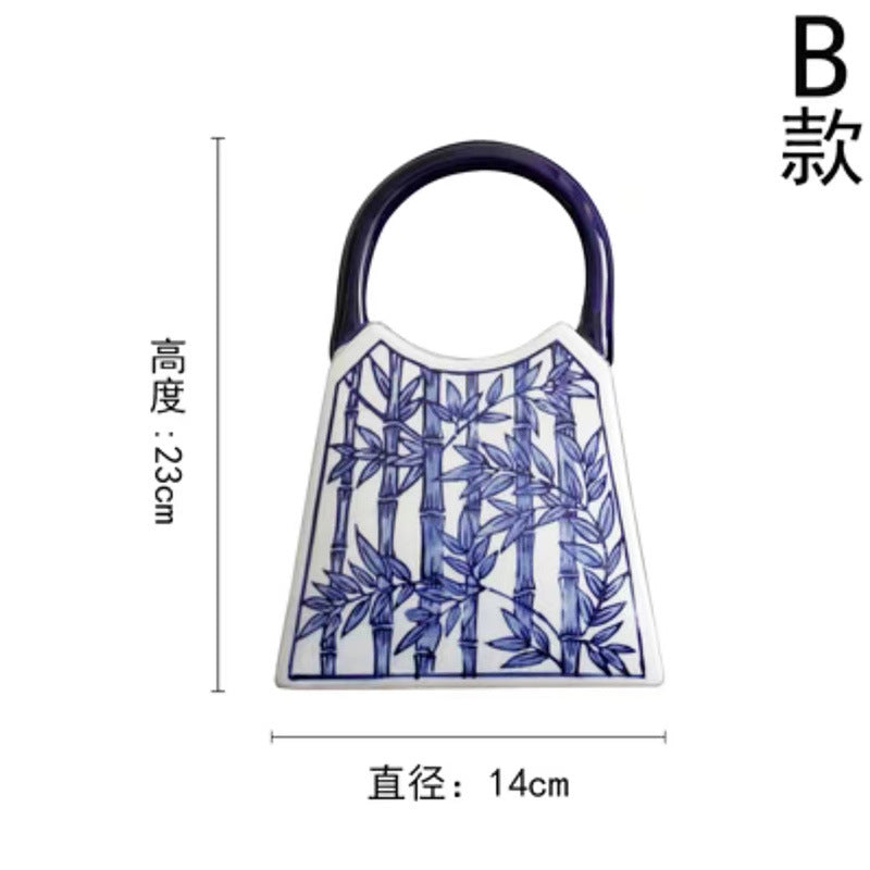 Blue and white bamboo motif ceramic handbag vase, 22 cm high