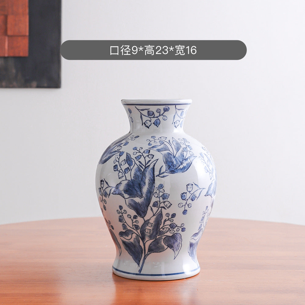 Blue and white botanical baluster vase, 16 cm wide and 23 cm high