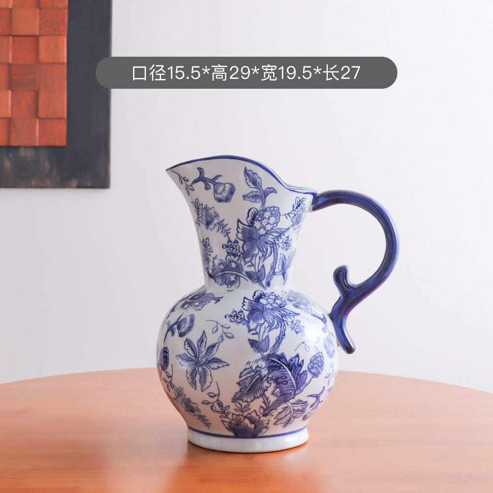 Blue and white botanical pitcher vase, 19.5 cm wide and 29 cm high