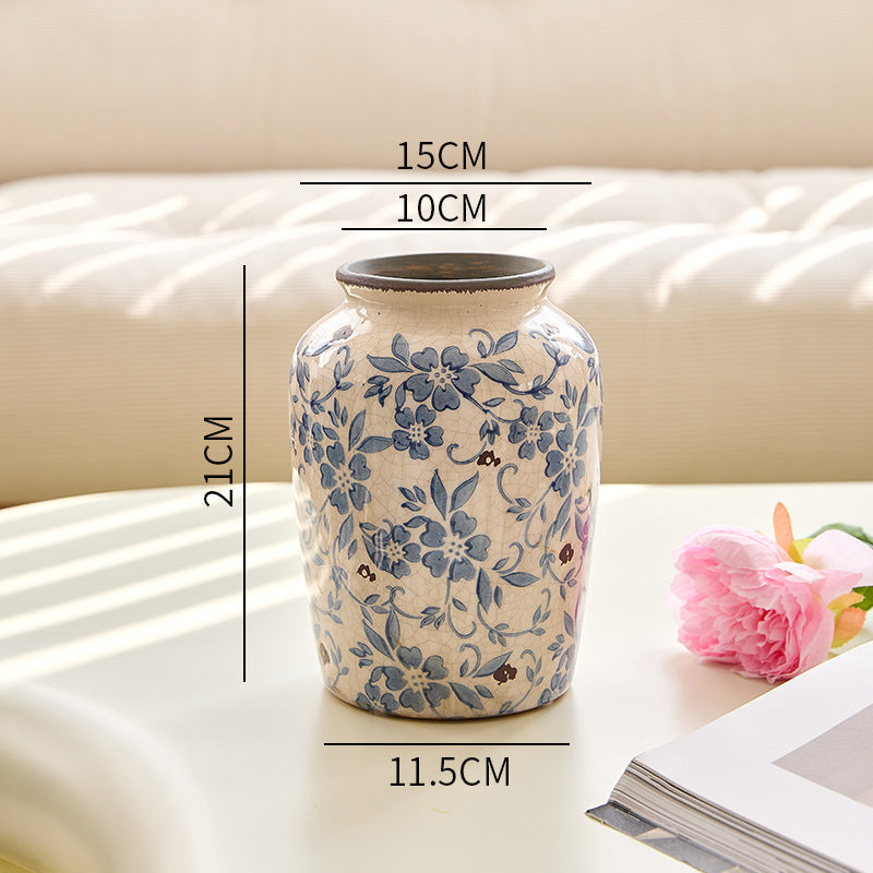 Classic blue and white floral round-base ceramic vase, 21 cm high