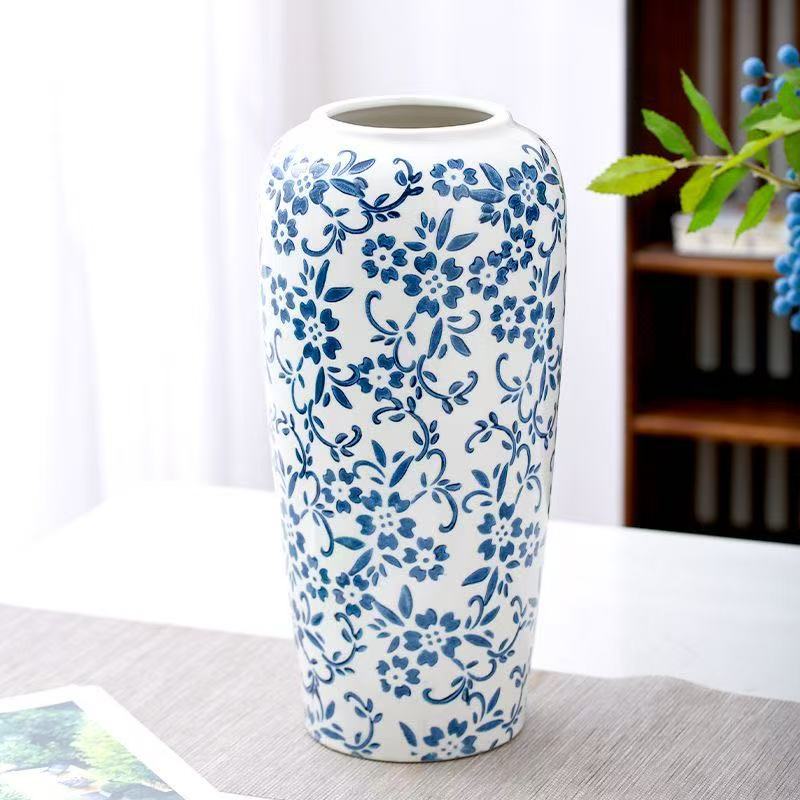 Large blue and white floral cylinder ceramic vase detail