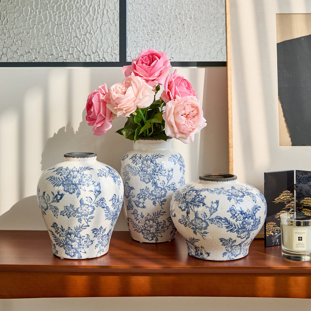 Blue and white ceramic vase trio styled with fresh flowers