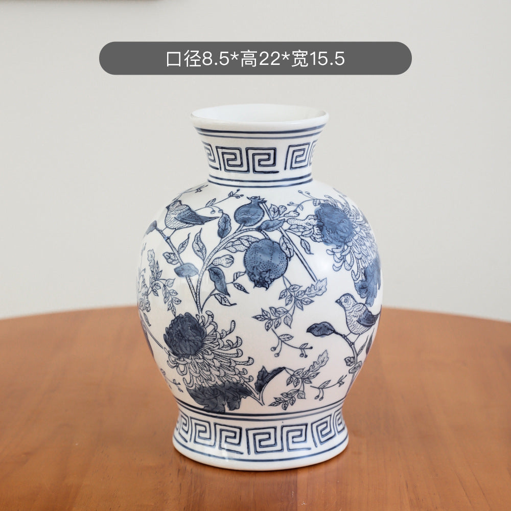 Blue and white Greek-key pomegranate floral jar, 15.5 cm wide and 22 cm high
