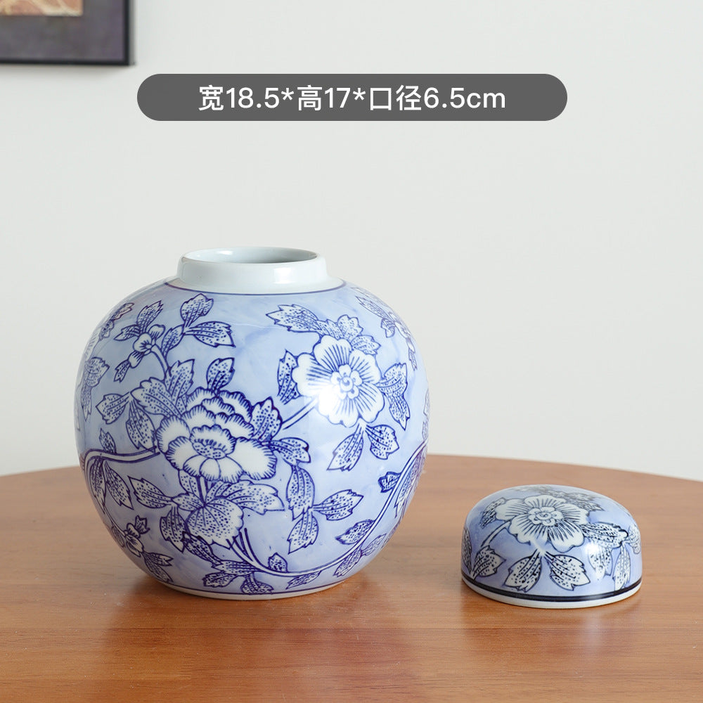 Blue and white lidded round jar, 18.5 cm wide and 17 cm high