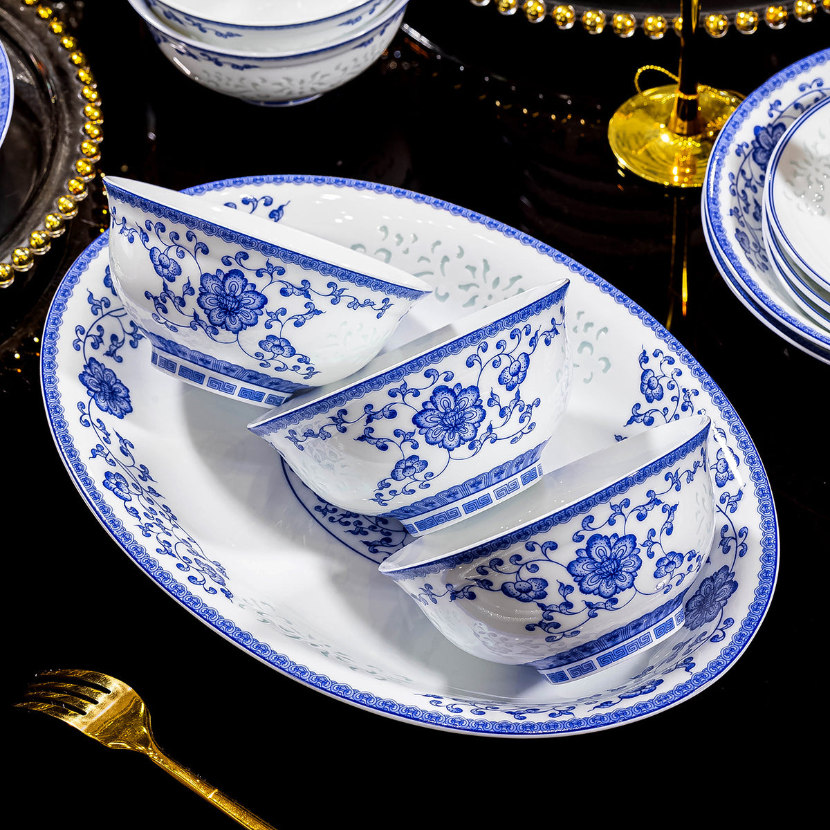 Blue and white Linglong porcelain bowls on oval serving platter