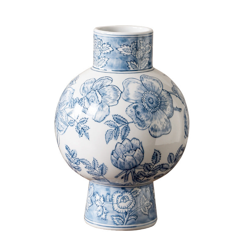 Blue and white floral pedestal orb ceramic vase