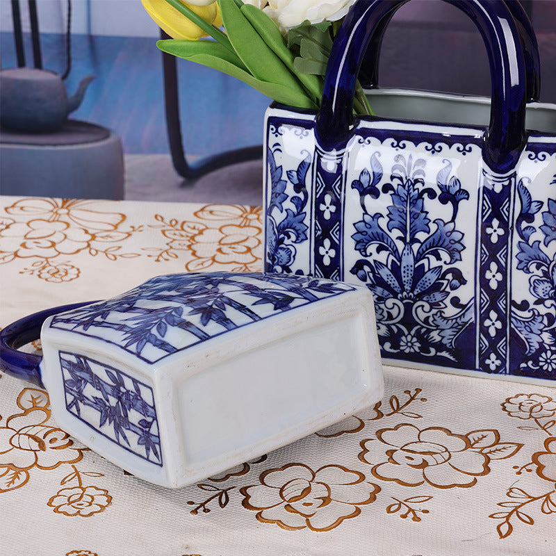 Blue and white rectangular handbag vase side and base detail
