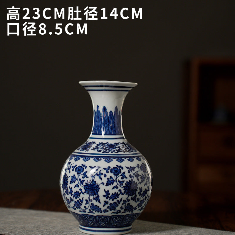 Blue and white tall-neck round ceramic vase, 23 cm high