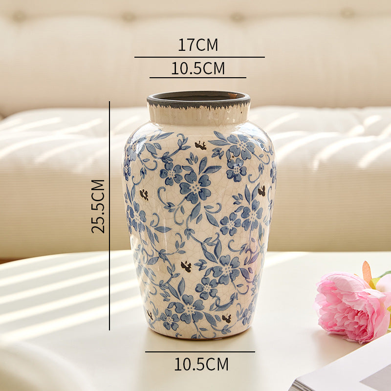 Blue and white tall-shoulder floral ceramic vase, 25.5 cm high