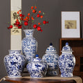 Blue and white Chinese vase collection styled with branches