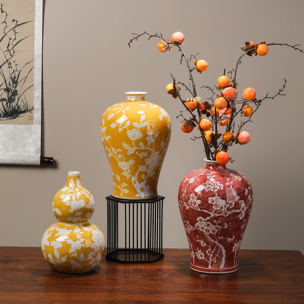 Blue and white, yellow and wine-red Chinese vase collection styled with branches