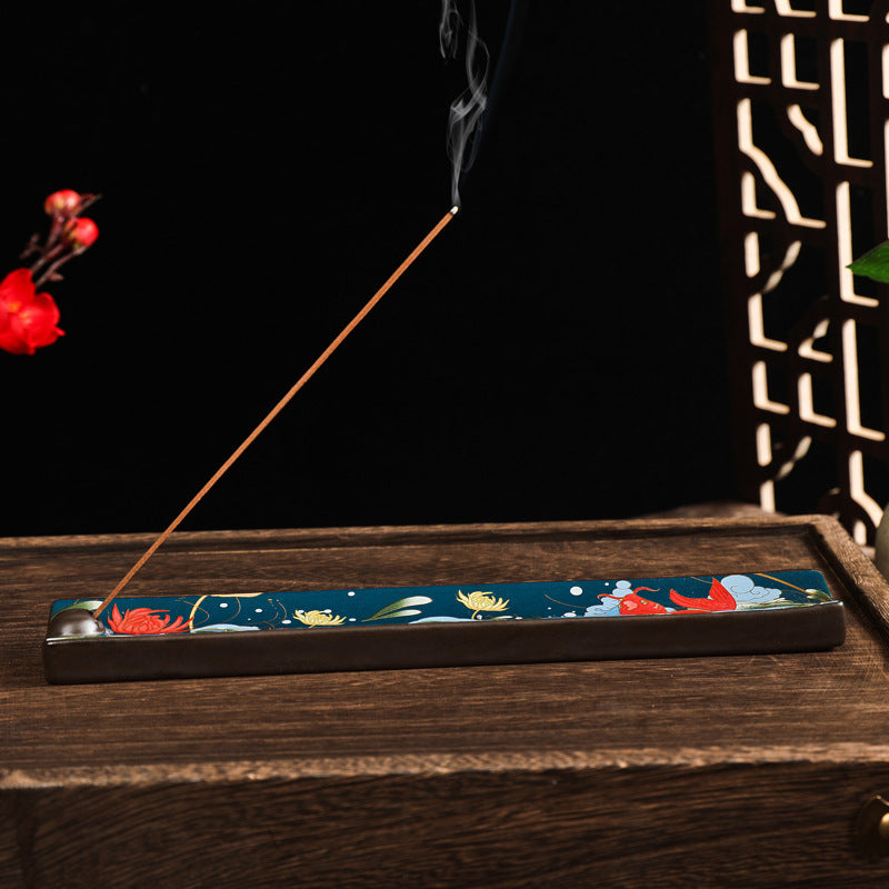 Carp leaping Dragon Gate incense holder styled with burning incense