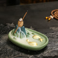 Celadon Fortune-Turning Bull round ceramic incense holder with mountain smoke effect