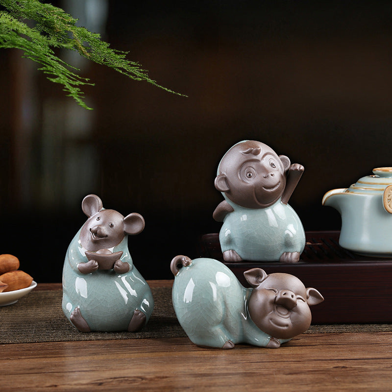 Celadon zodiac tea pets styled with Chinese tea ware