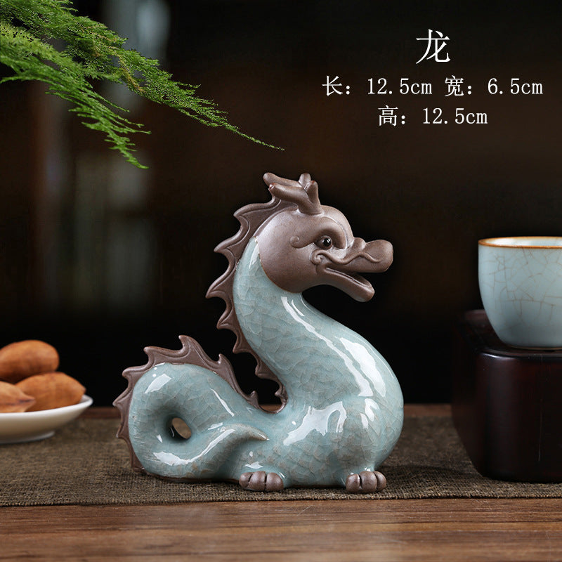 Celadon Dragon zodiac tea pet styled on gongfu tea table