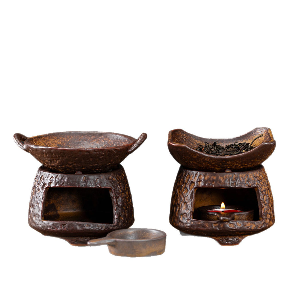 Two antique ceramic tea leaf roasting warmer styles with candle tray