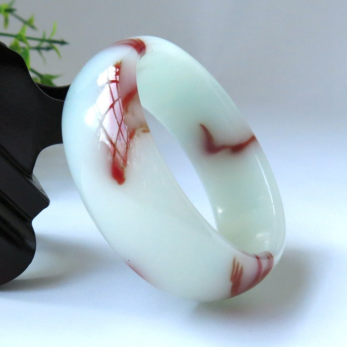 Certified jade bracelet, white stone with red decorative mineral veining