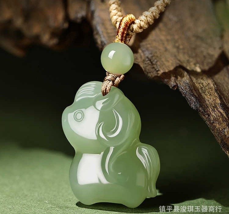 Qing Shui green Hetian jade horse pendant polished carving close-up