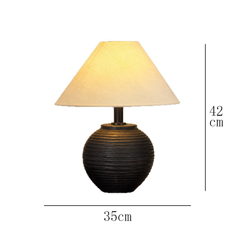 Black ribbed ceramic table lamp, approximately 35 cm wide and 42 cm high