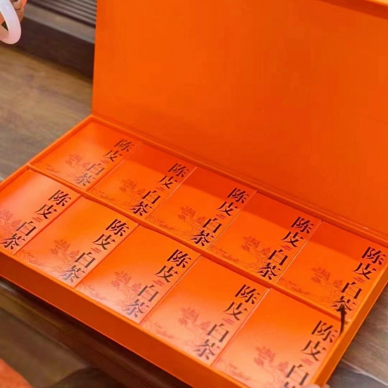 Fuding aged white tea with Chenpi individually wrapped mini bricks in orange gift box