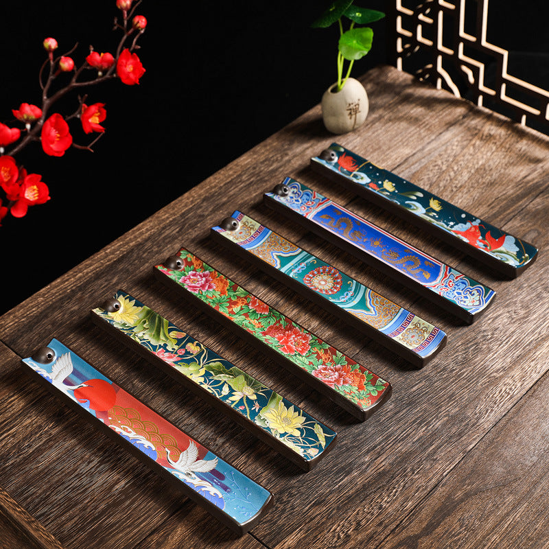 Six Chinese enamel-style ceramic incense stick holder tray designs