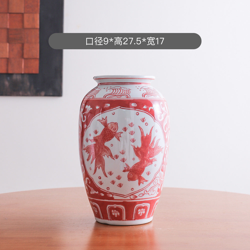 Coral red koi and floral ceramic jar, 17 cm wide and 27.5 cm high