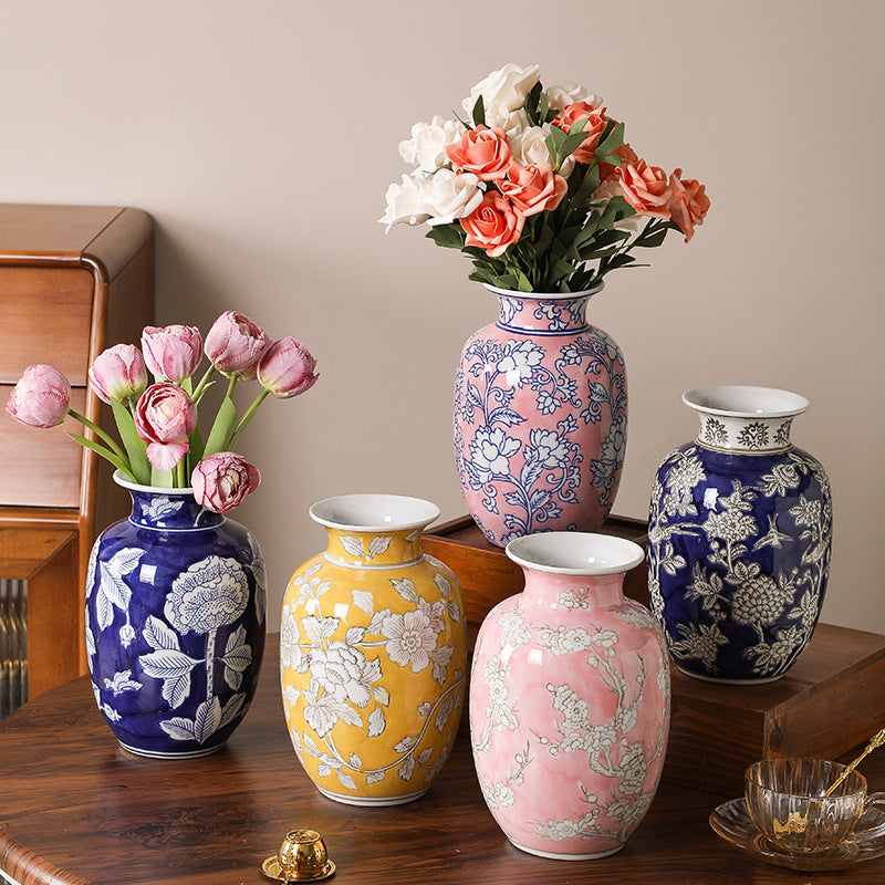 Chinoiserie ceramic vase collection styled with flowers in blue, yellow, pink and indigo