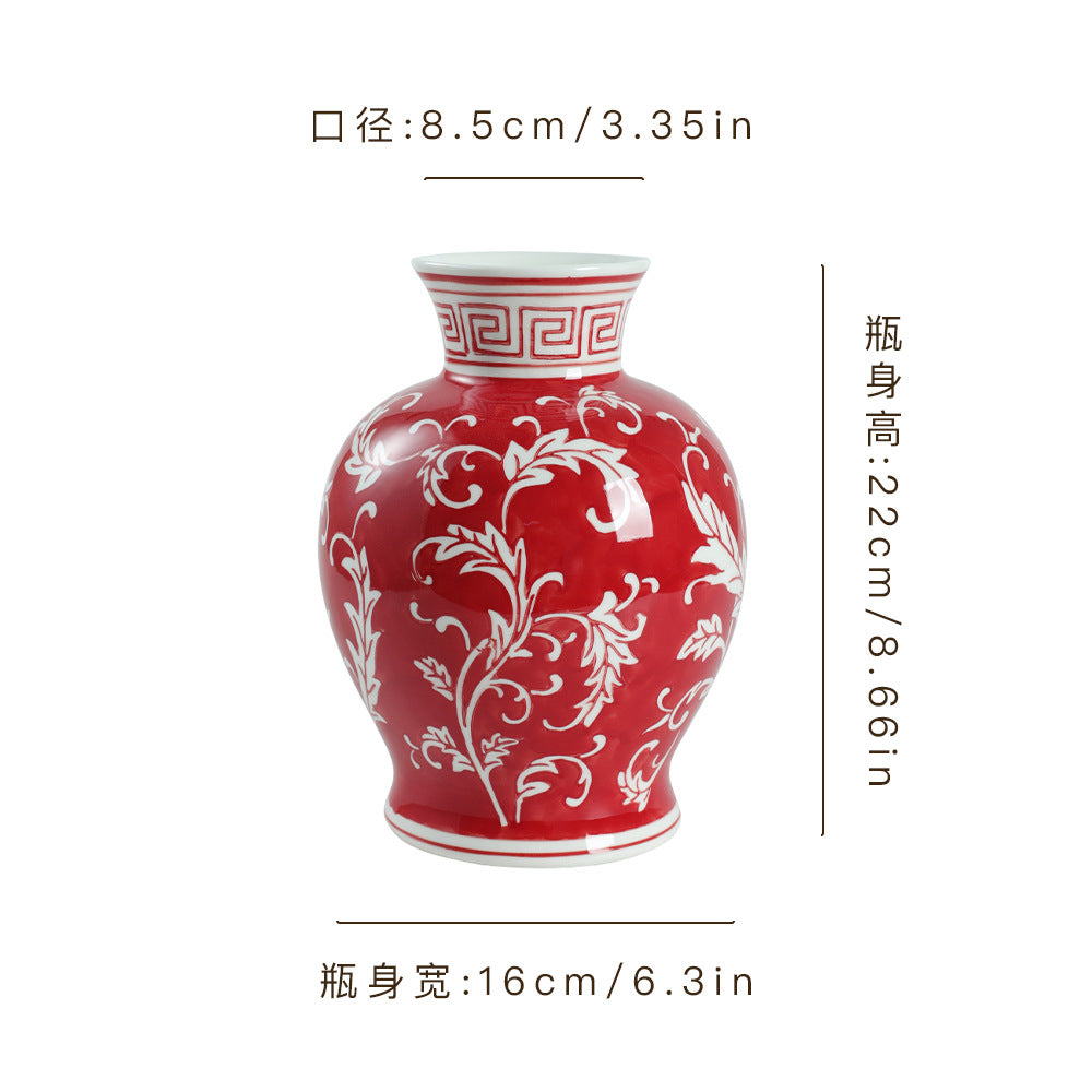 Cinnabar red and white scroll ceramic jar, 16 cm wide and 22 cm high