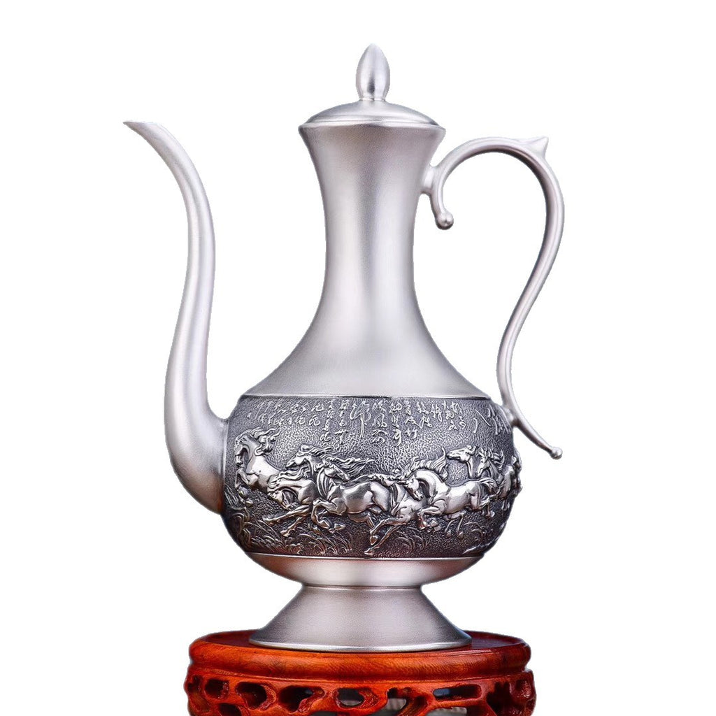 Relief Eight Horses motif on 999 silver wine set