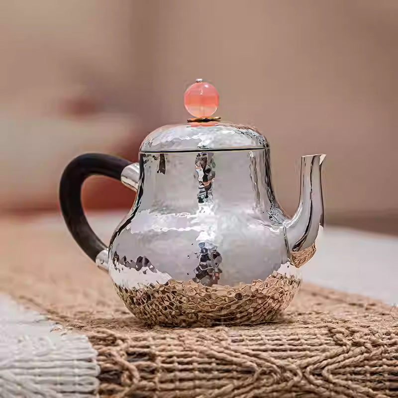 Hand-hammered 999 silver mini teapot detail